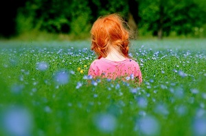 poverty4 red head little girl in field