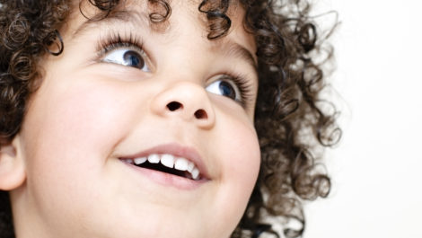 iStock_000011886871XLarge-child-with-her-toothy-smile iStock_000011886871XLarge-child-with-her-toothy-smile